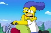 Homer and Marge Simpson go for a ride in THE SIMPSONS MOVIE